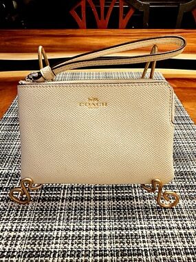 Coach Cream Leather Wristlet with Gold Logo